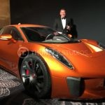 Rodric David with James Bonds Jaguar